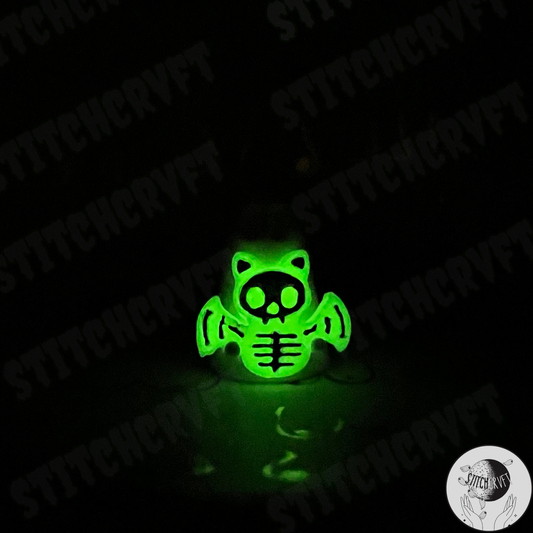 Ghost holding glowing skelebat | Handmade to order