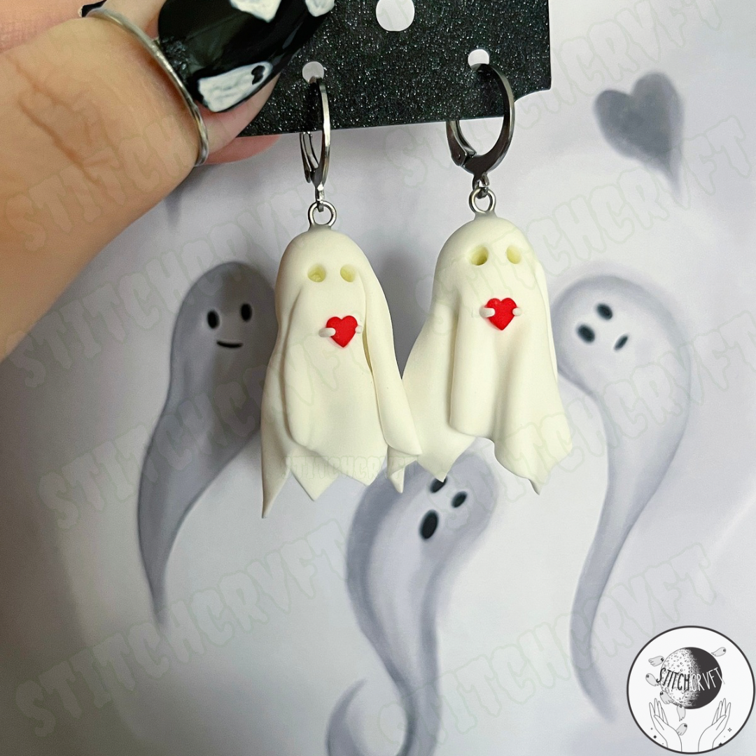 Sheet ghost earrings holding tiny heart with glowing eyes | Handmade to order