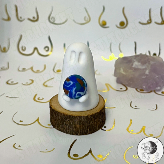 Ghost holding tiny planet earth  | Limited small batch