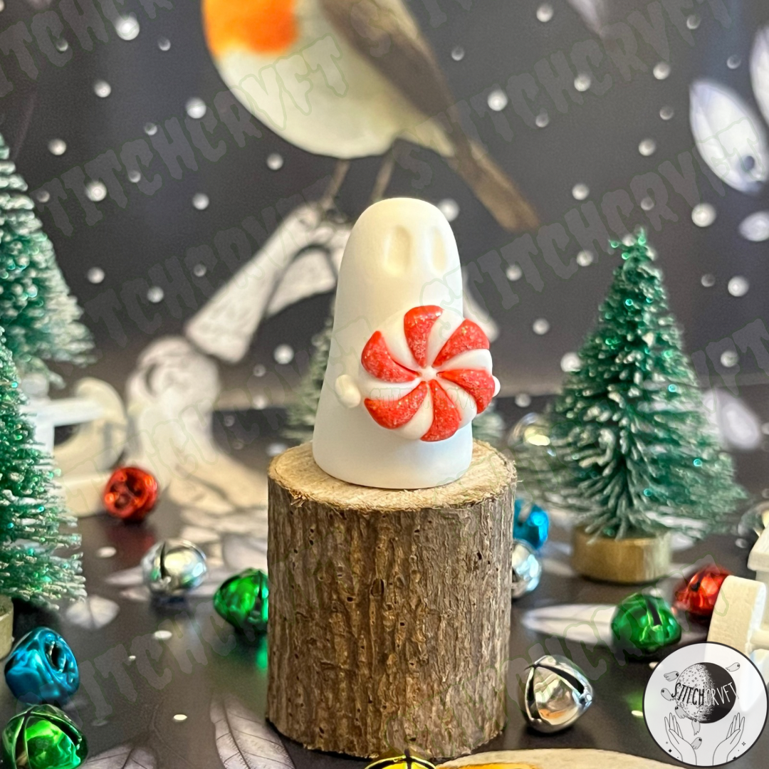 Ghost holding tiny peppermint swirl candy | Handmade to order