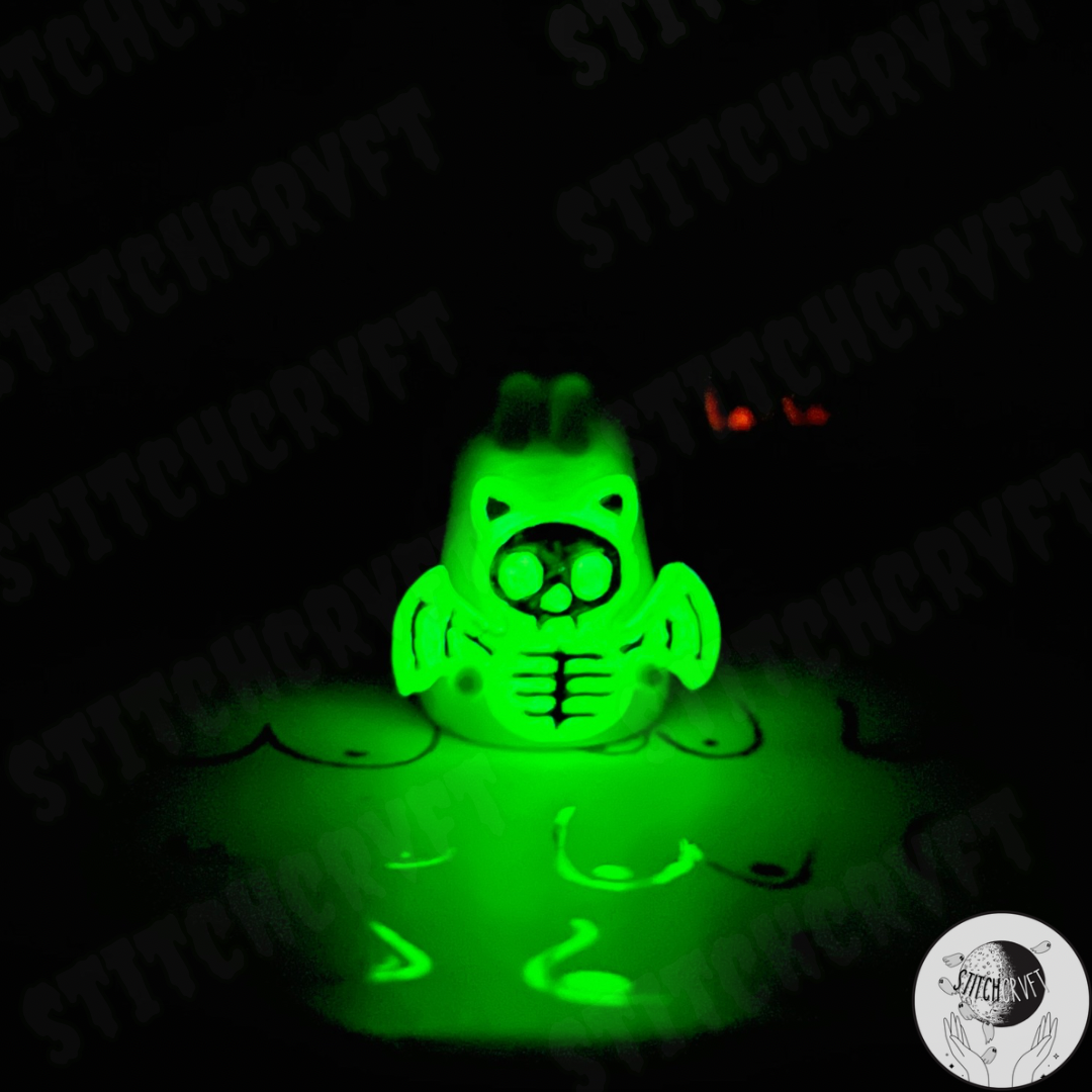 Ghost holding glowing skelebat | Handmade to order