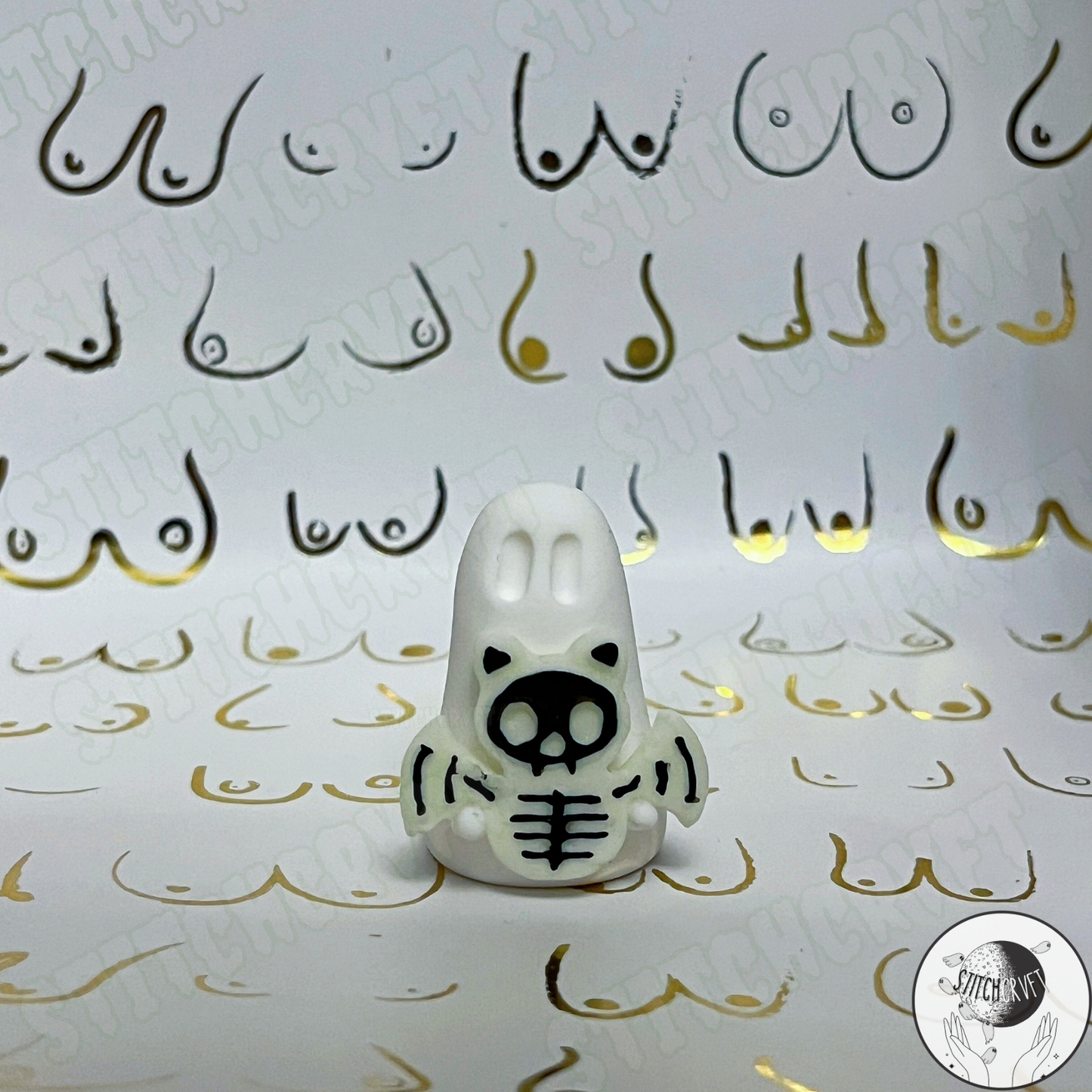 Ghost holding glowing skelebat | Handmade to order