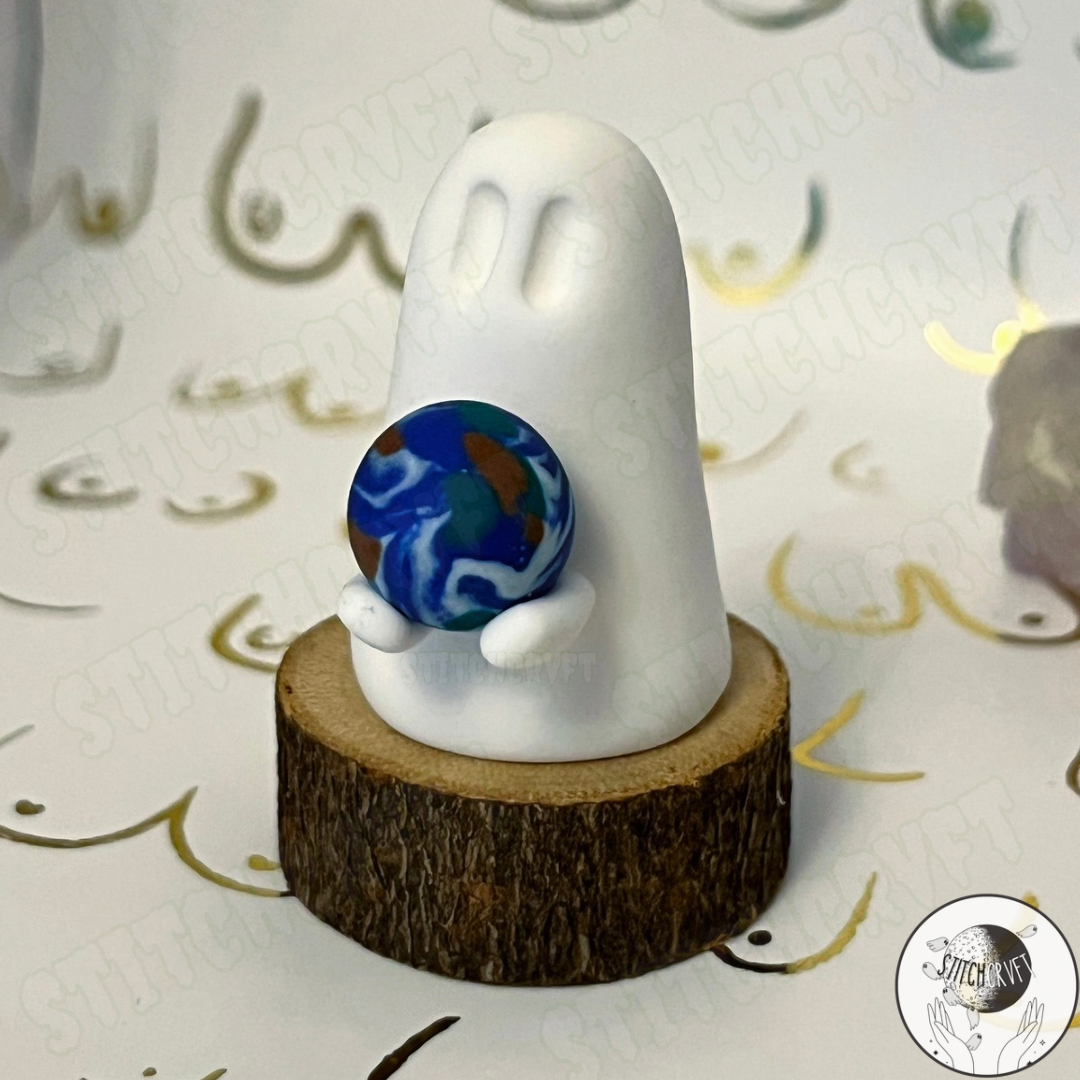 Ghost holding tiny planet earth  | Limited small batch
