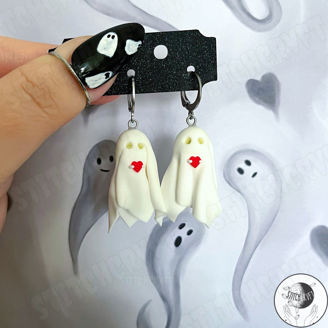 Sheet ghost earrings holding tiny heart with glowing eyes | Handmade to order