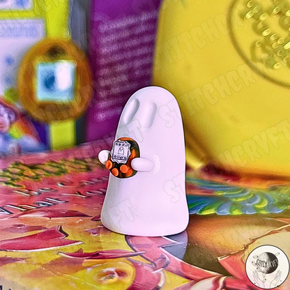 Ghost holding tiny virtual pet toy 90s edition | Limited small batch