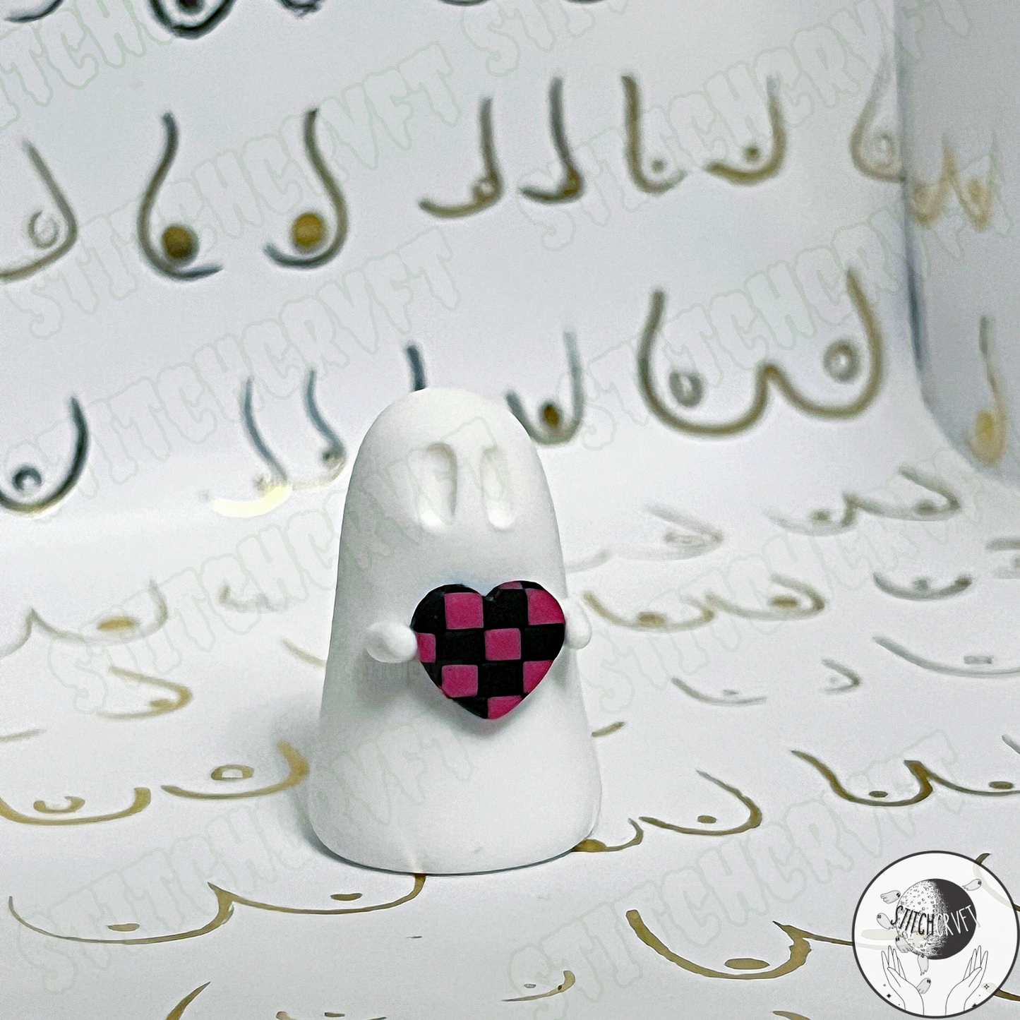 Ghost holding tiny chequered heart | Limited small batch