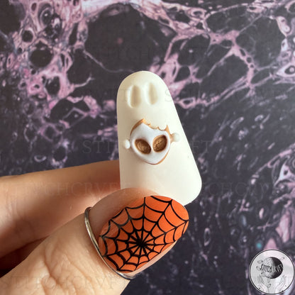 Ghost holding alien head cookie | Handmade to order