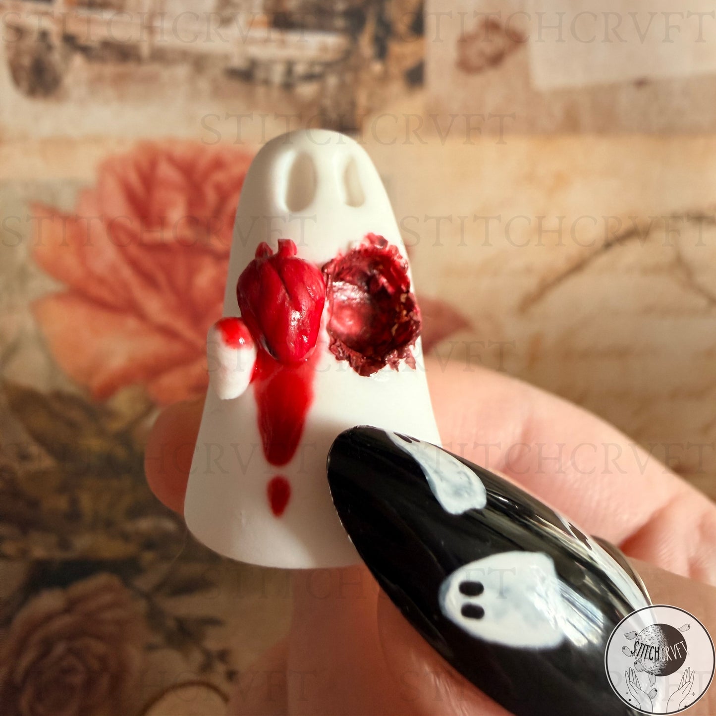 Ghost holding carved out anatomical heart | Handmade to order