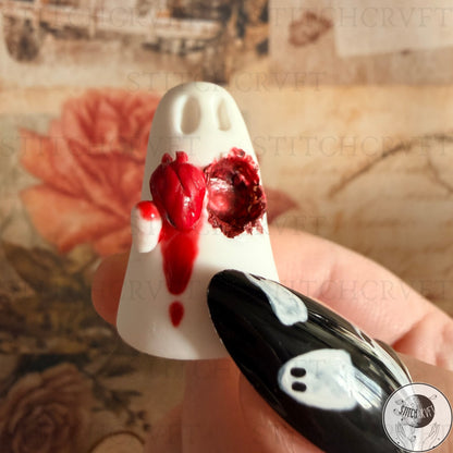 Ghost holding carved out anatomical heart | Handmade to order
