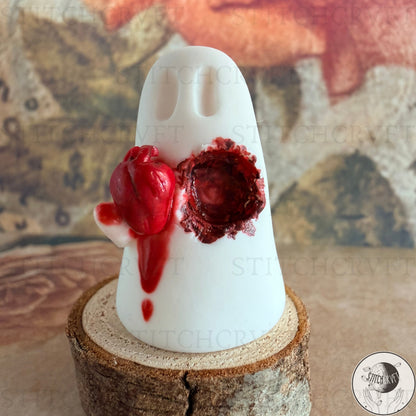 Ghost holding carved out anatomical heart | Handmade to order