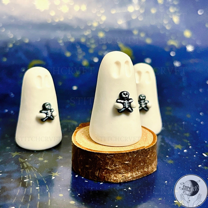 Ghost holding tiny goth gingerbread figure | Handmade to order