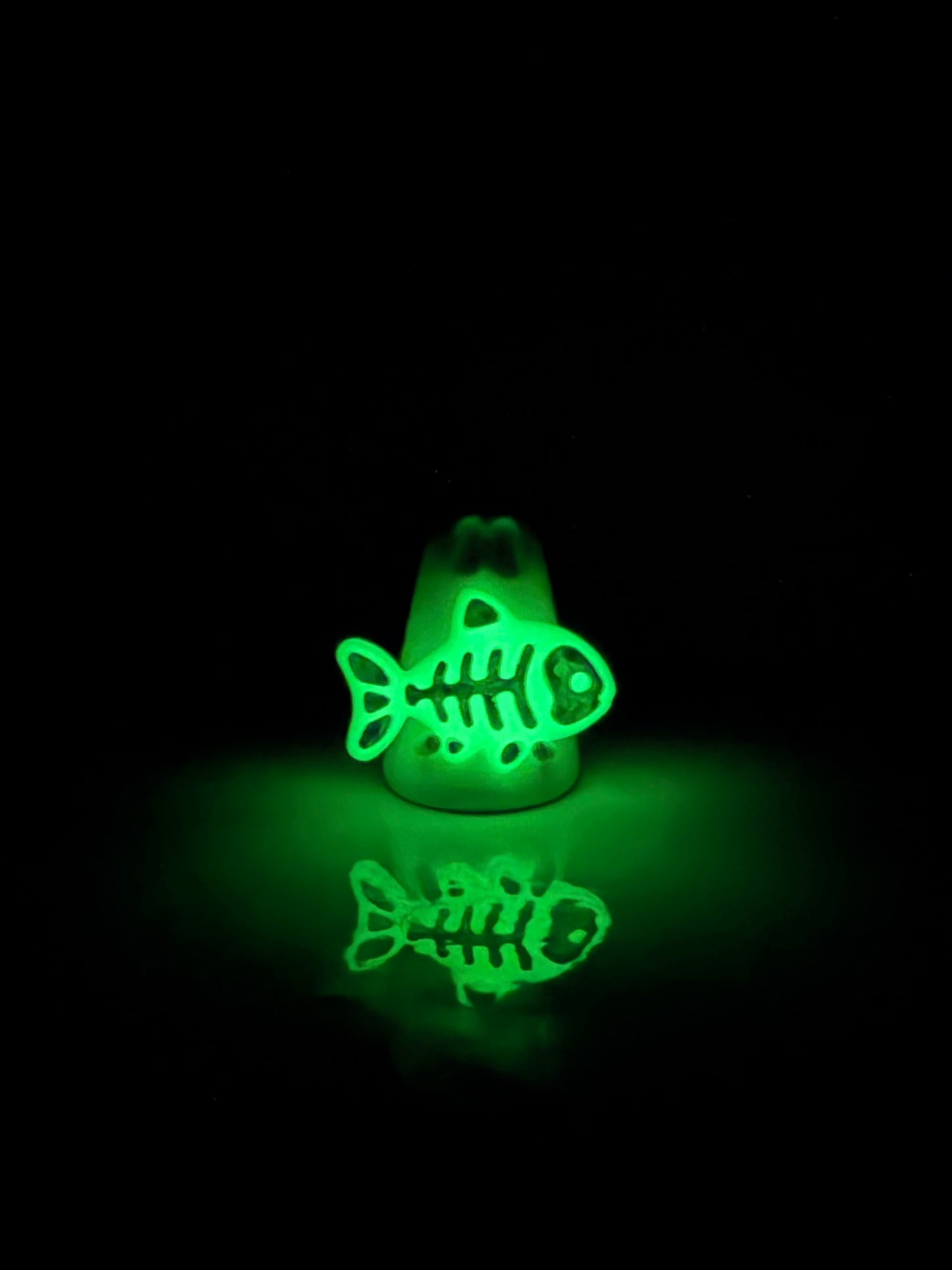 Ghost holding glowing skeleton fish | Handmade to order