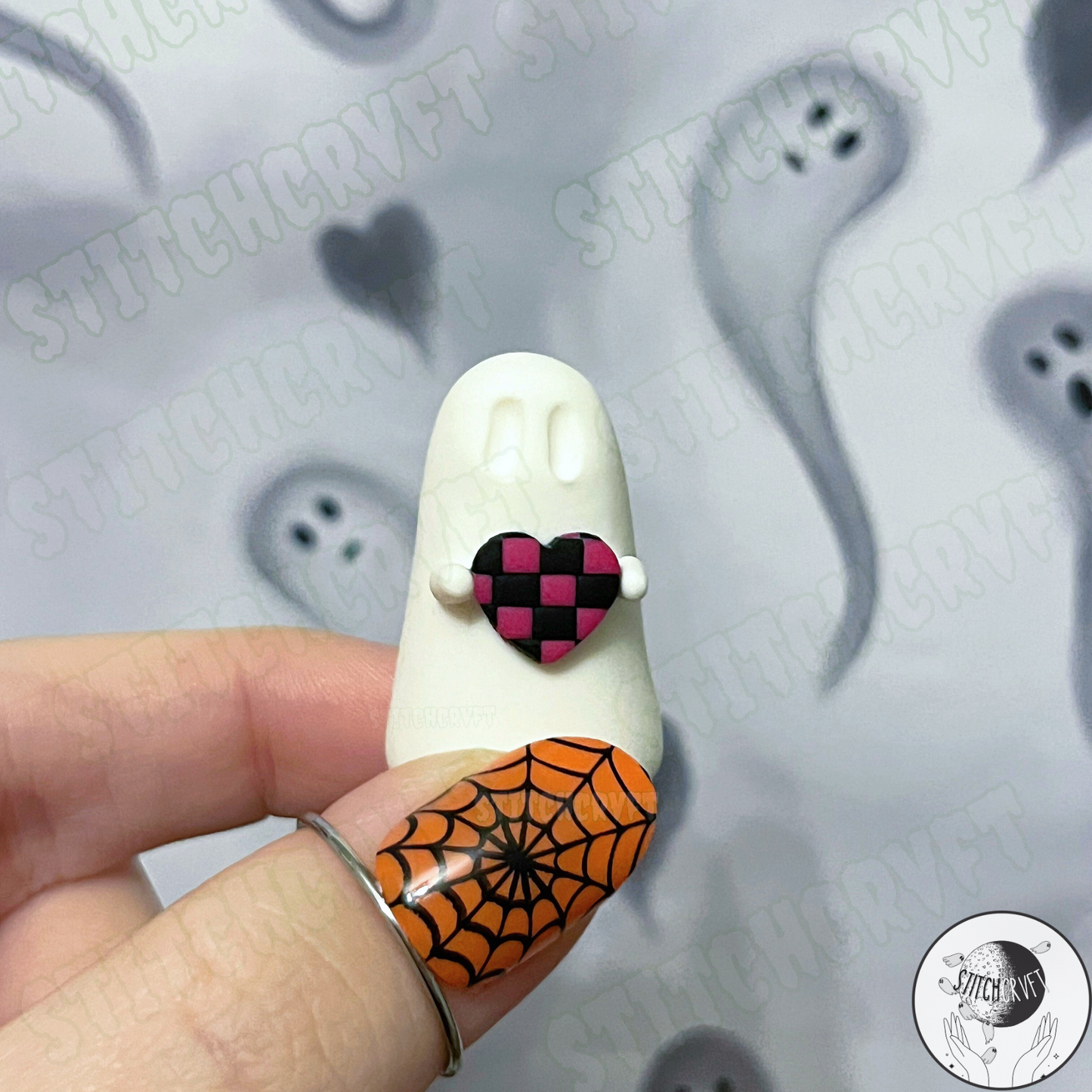 Ghost holding tiny chequered heart | Limited small batch