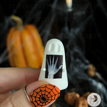 Ghost holding tiny x-ray | Handmade to order