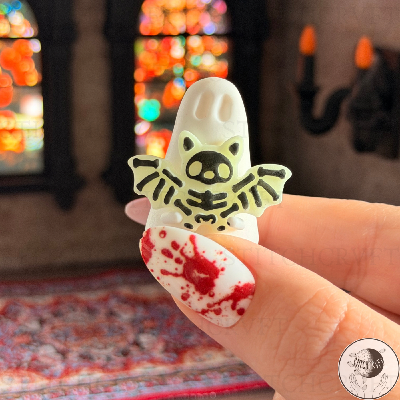 Ghost holding glowing skeleton bat | Handmade to order