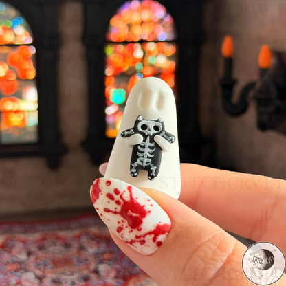 Ghost holding squishy cat with hand-painted micro skeleton | Handmade to order