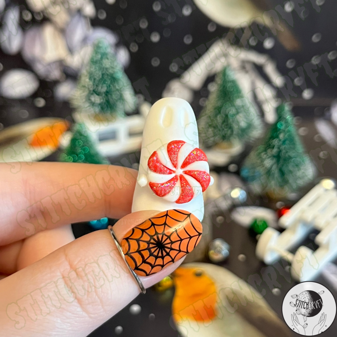 Spookmas Ghost holding tiny peppermint swirl candy | Handmade to order