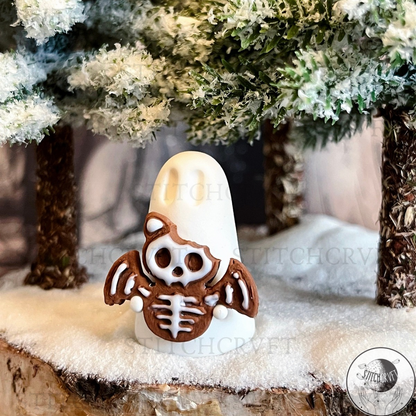 Ghost holding tiny gingerbread skelebat | Handmade to order