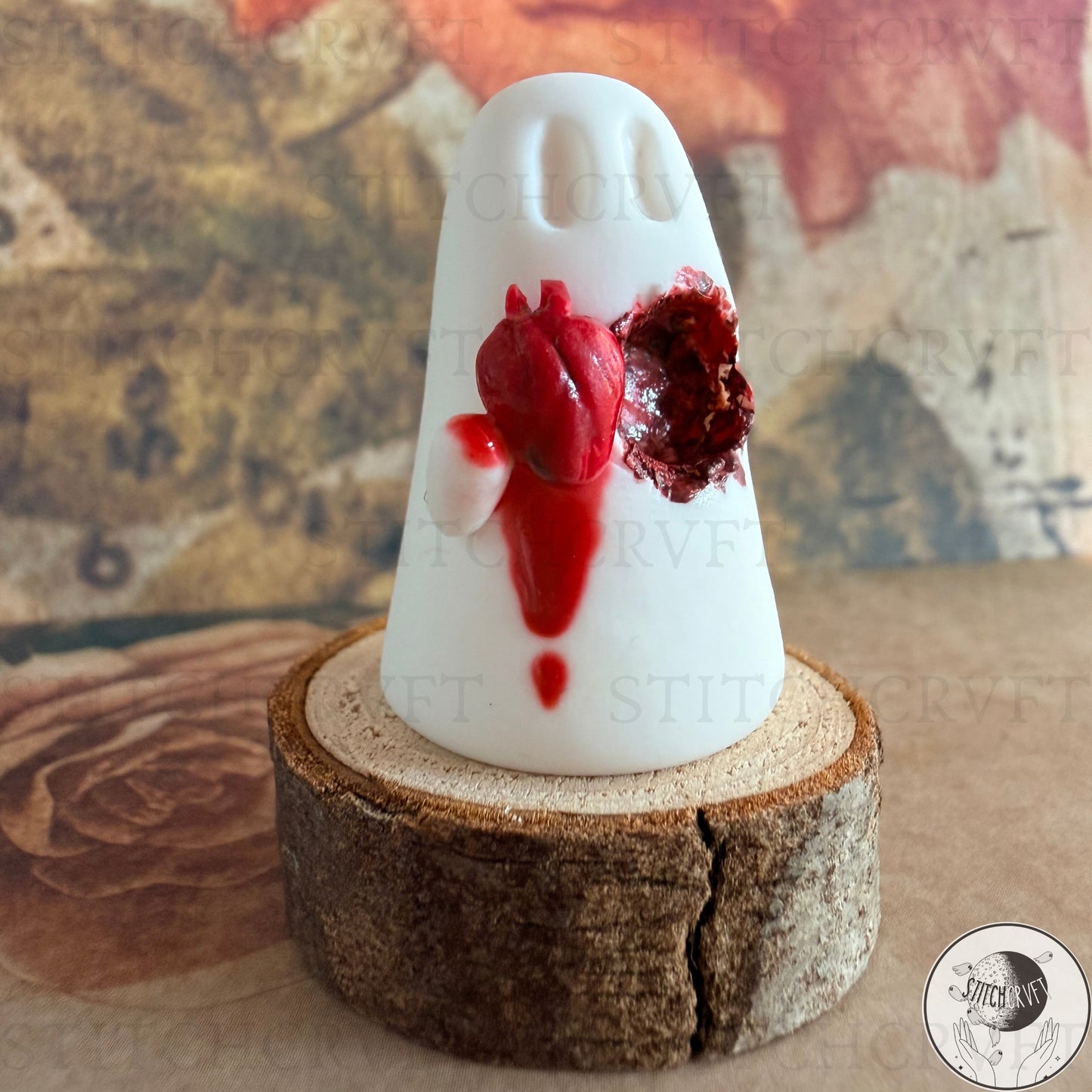 Ghost holding carved out anatomical heart | Handmade to order