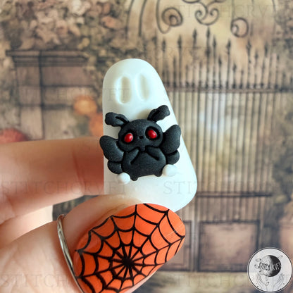 Ghost holding mini mothman familiar  | Handmade to order