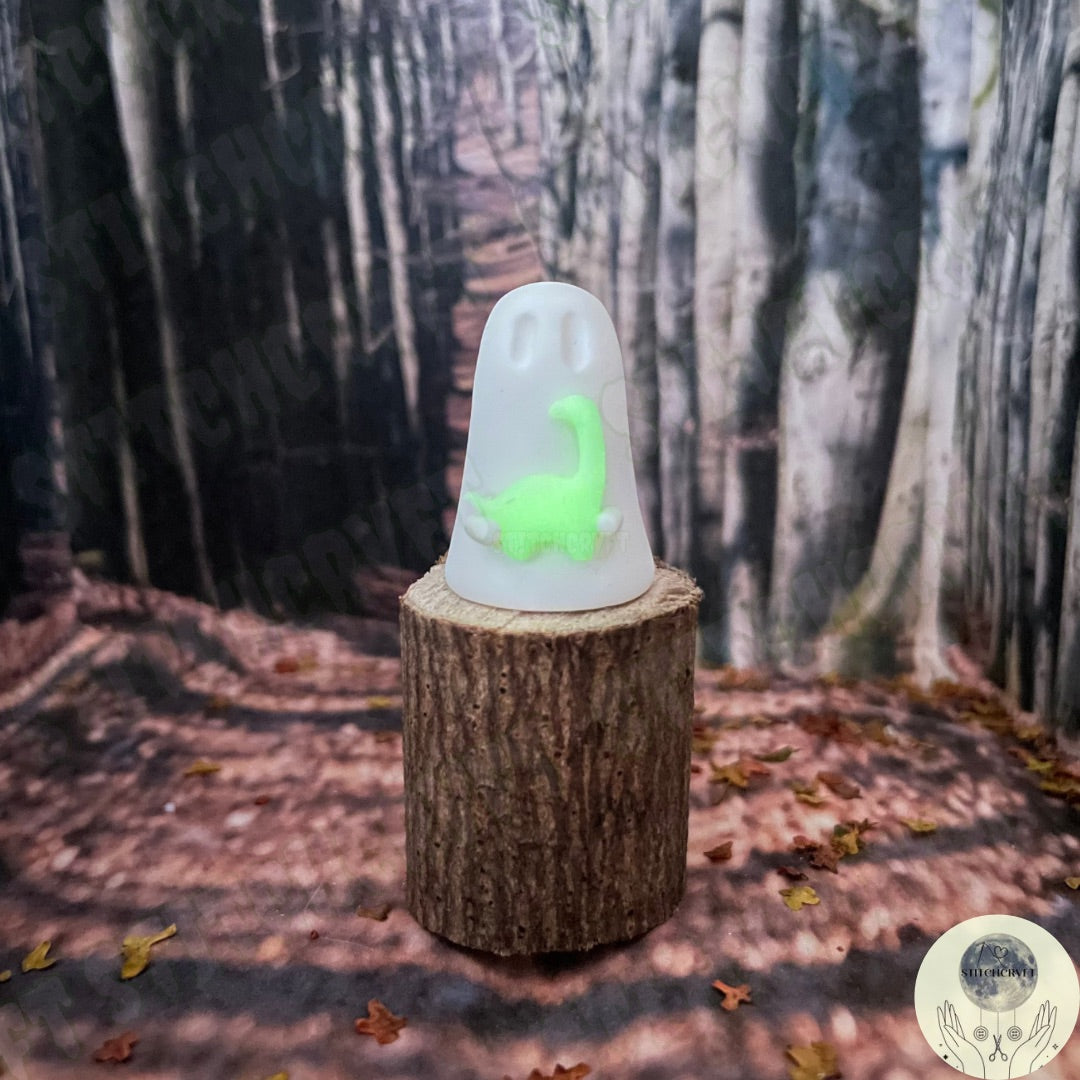 Ghost holding tiny glowing brontosaurus | Handmade to order