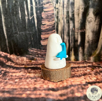 Ghost holding tiny brontosaurus | Handmade to order