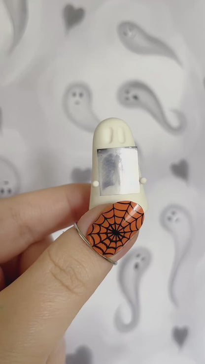 Ghost holding tiny x-ray | Handmade to order