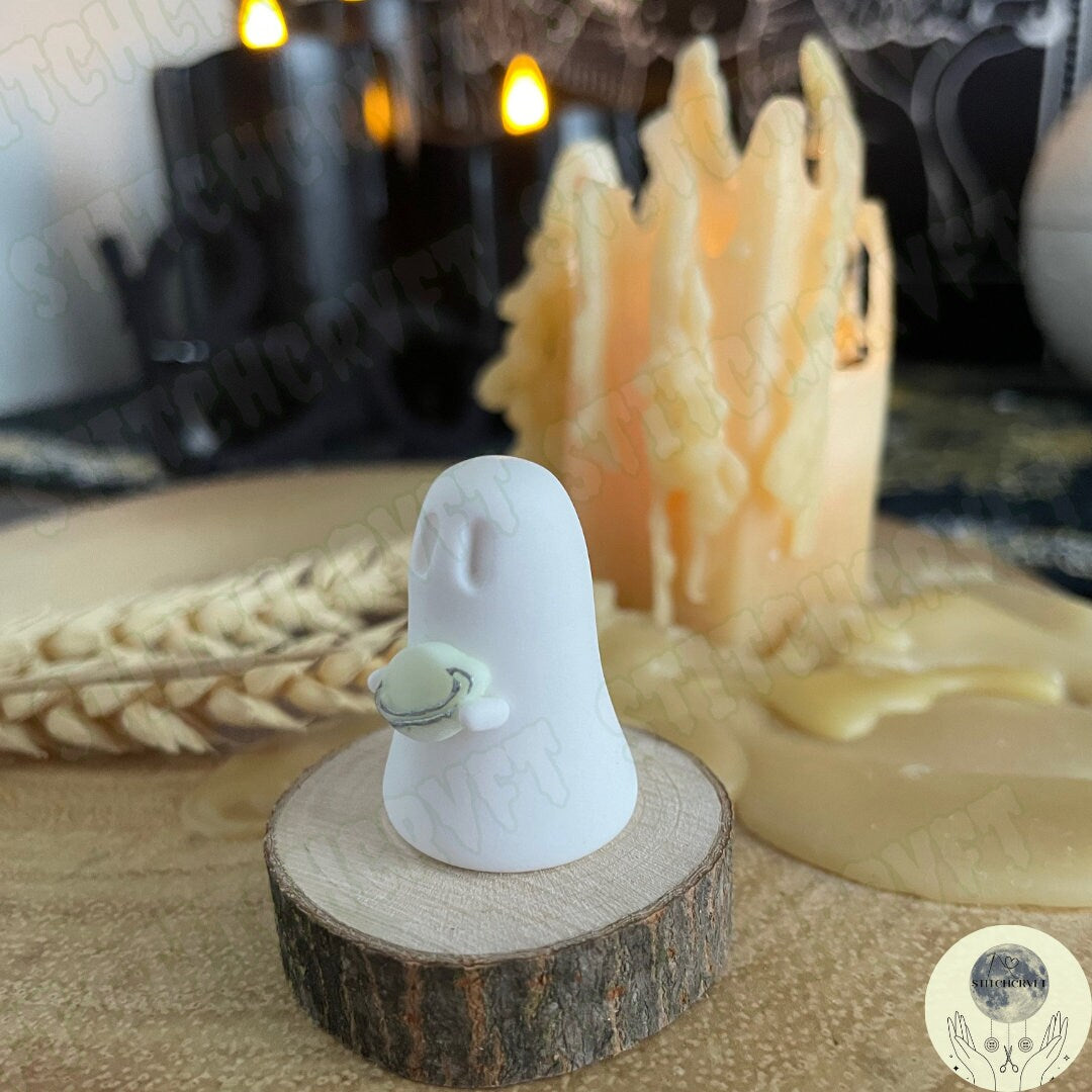 Ghost holding glowing planet | Handmade to order