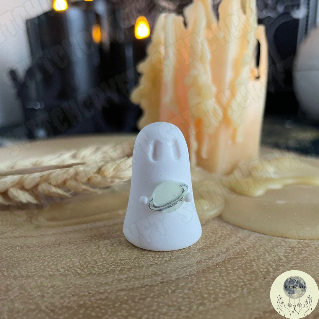 Ghost holding glowing planet | Handmade to order