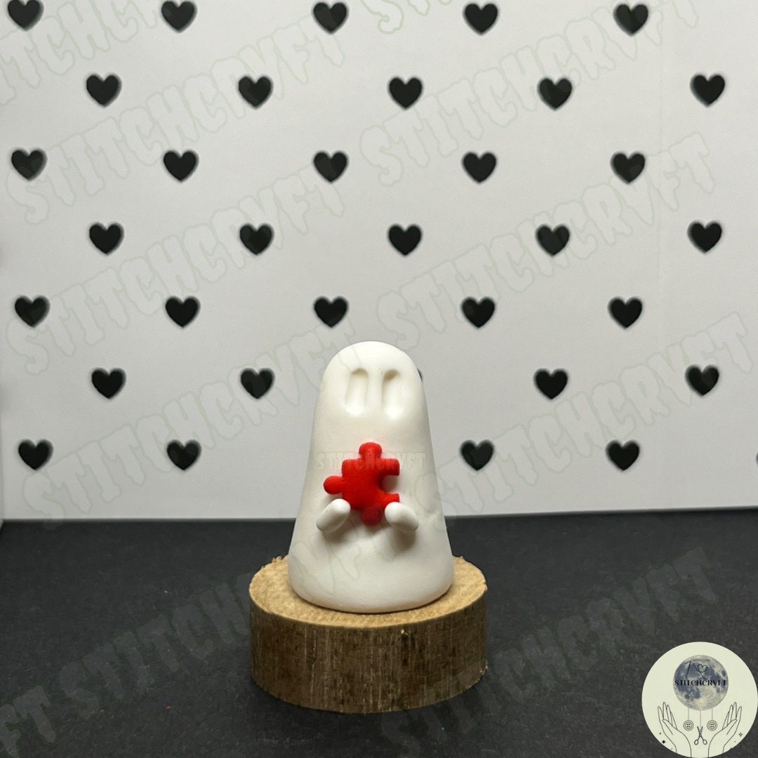 Ghost holding tiny puzzle piece | Handmade to order