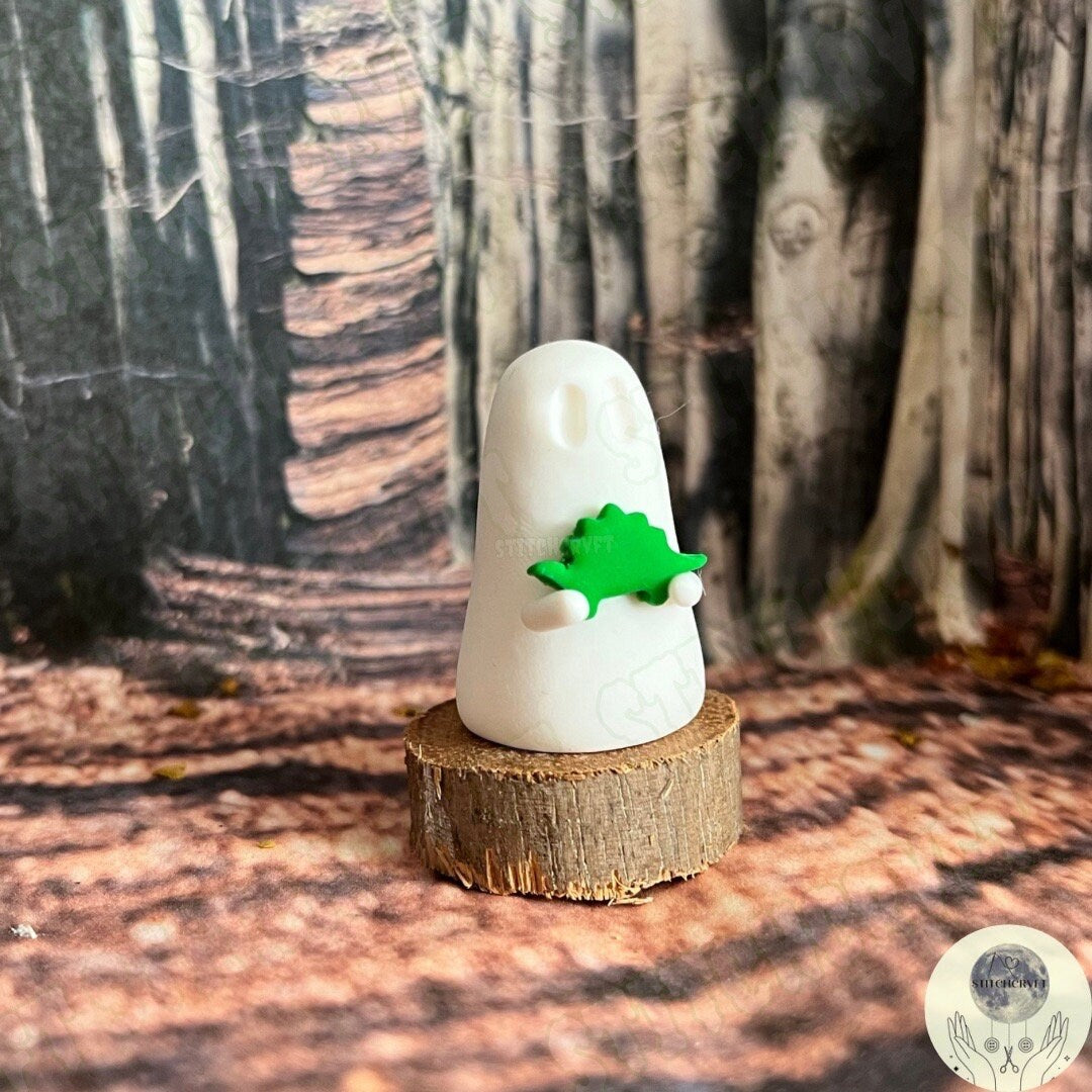 Ghost holding tiny stegosaurus | Handmade to order